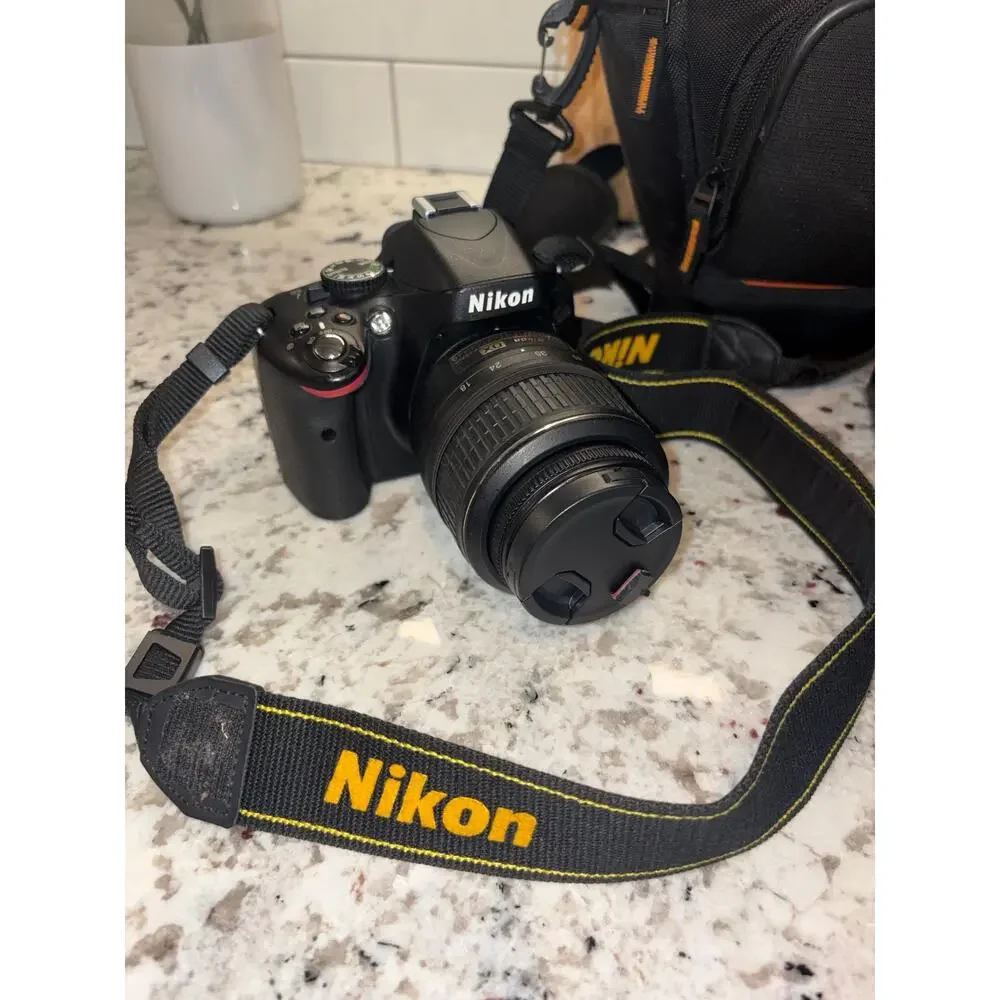 Nikon D5100 DSLR + 18-55mm VR Lens Kit, Case & Extra Batteries